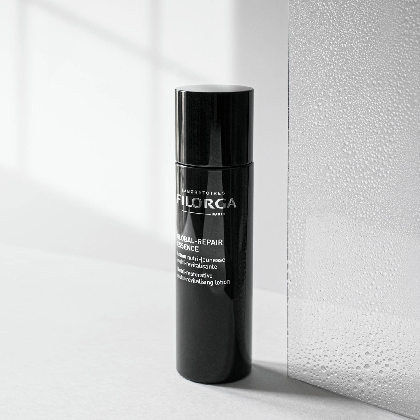 FILORGA GLOBAL-REPAIR ESSENCE closed black bottle