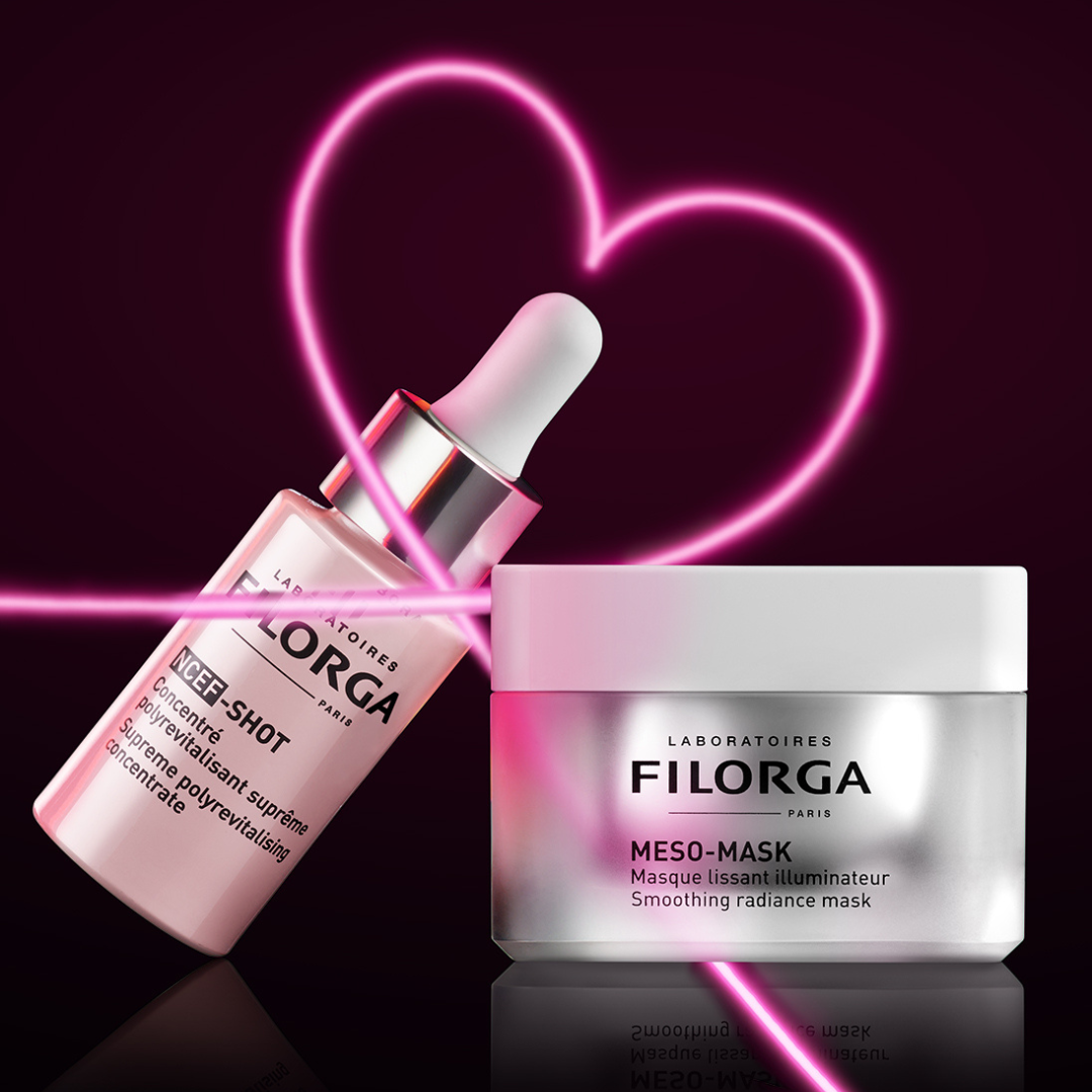 NCEF-SHOT anti-aging serum treatment leaning on MESO-MASK jar surrounded by a pink heart