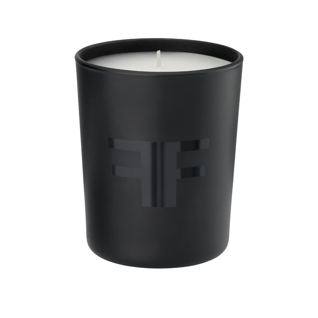 FILORGA-scented mini candle in black glass jar with embossed double F FILORGA logo