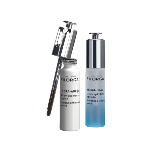 HYDRA-AOX [5] open bottle with pipette next to HYDRA-HYAL SERUM closed bottle