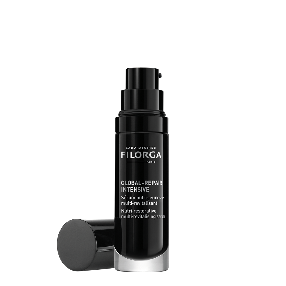 FILORGA GLOBAL-REPAIR INTENSIVE open black pump bottle with black cap on its side