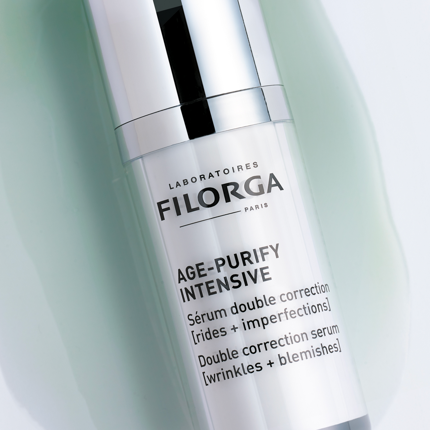FILROGA AGE-PURIFY INTENSIVE closed bottle on greet texture background