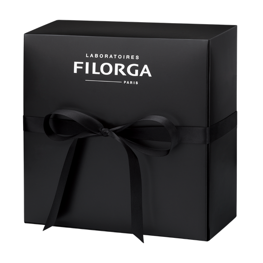FILORGA logo on black box with black ribbon bow